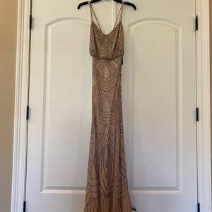Adrianna Papell gown. Never worn. New with tag. Size 0.